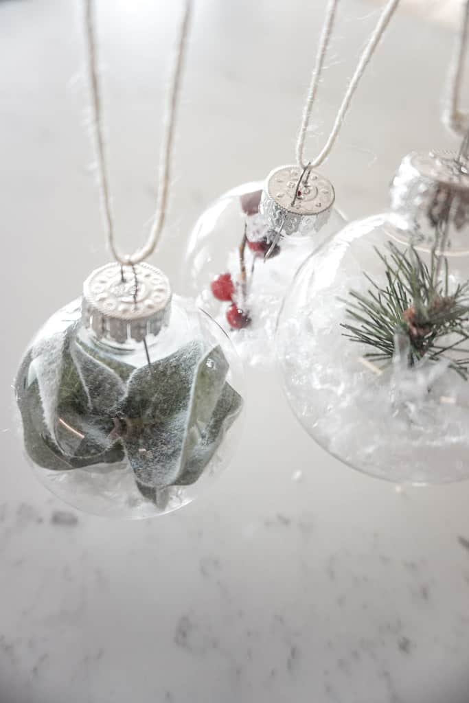 D.I.Y Christmas Ornaments with Greenery in the middle with snow