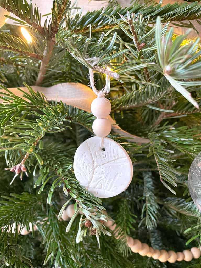 D.I.Y Clay Ornaments pictured hanging on a Christmas tree