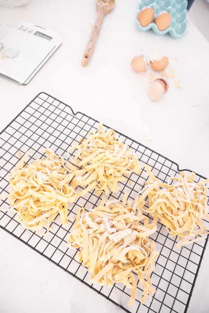 Homemade Gluten-Free Pasta drying on a cooling rack