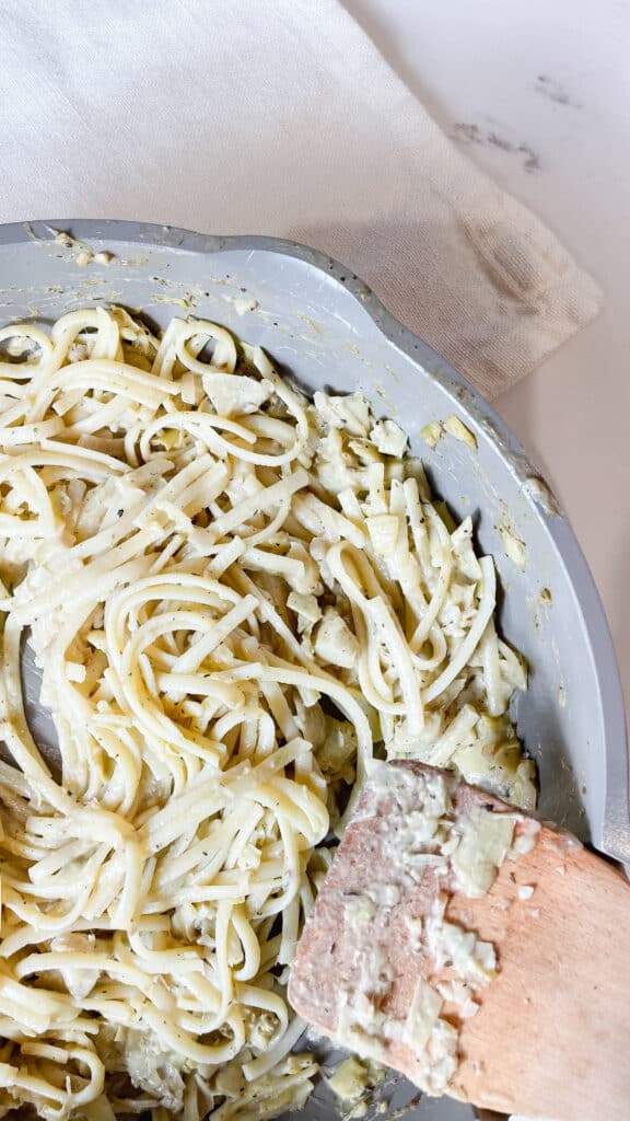 The always pan review is here along with a recipe for an artichoke pasta which is pictured in the always pan - cream sauce and linguine noodles