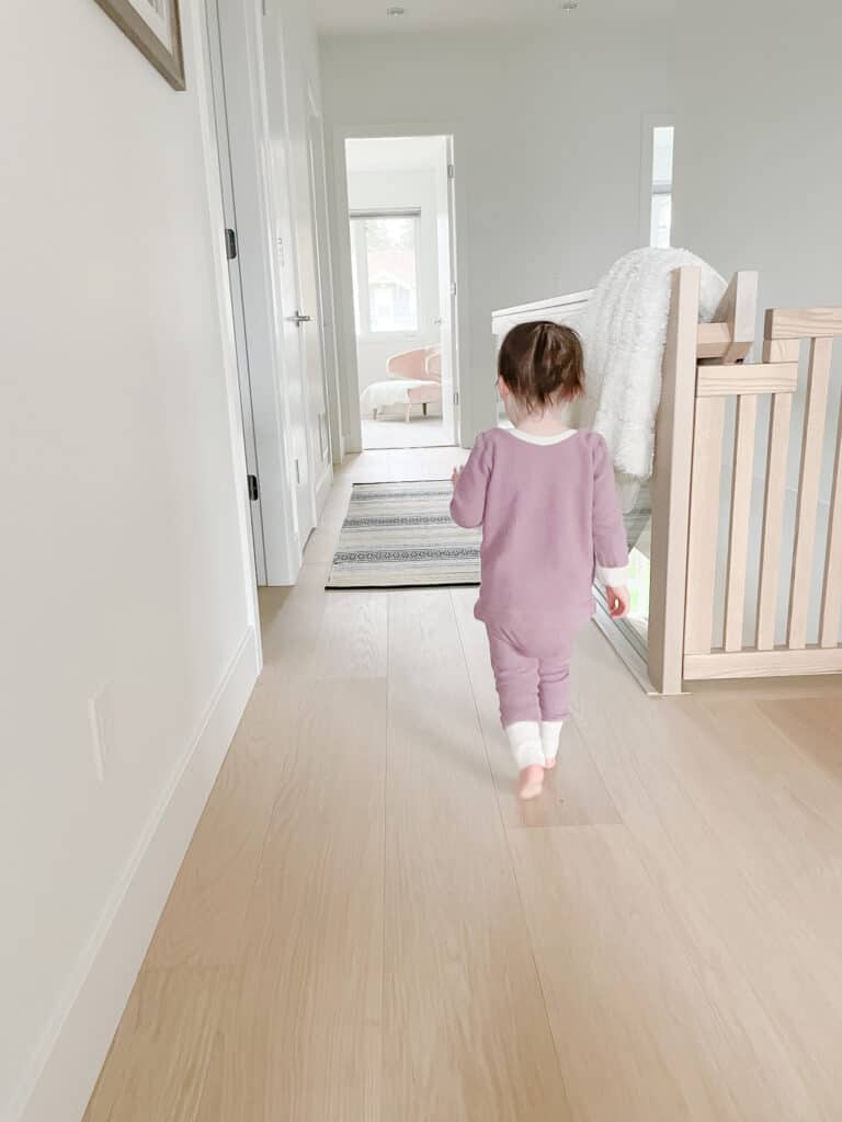 Running through some local Vancouver shops for kids that includes Brighton Handmade - a local North Vancovuer mama who designs and sews kid's clothes - which is what Sloane is wearing a cute purple lounge set with cream cuffs as she walks down the hallway.