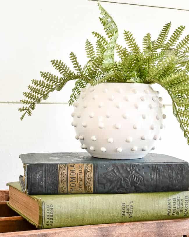 DIY Inspiration from Little House of Four - a really cute vase painted white with bumps on it.