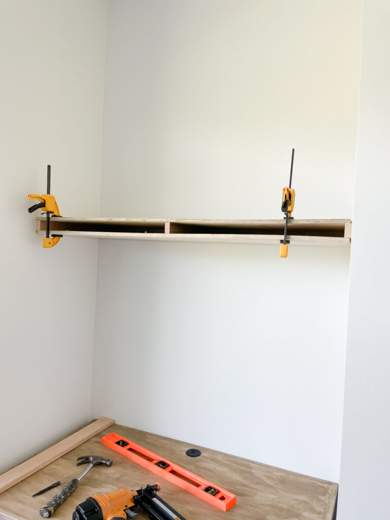 installing a floating shelf - the frame, top and bottom