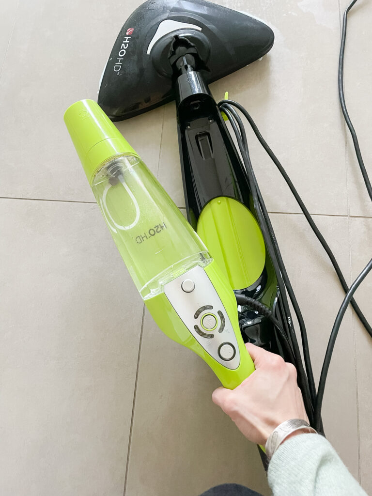 thane steam mop review with the hand held version of the mop removed from the larger mop