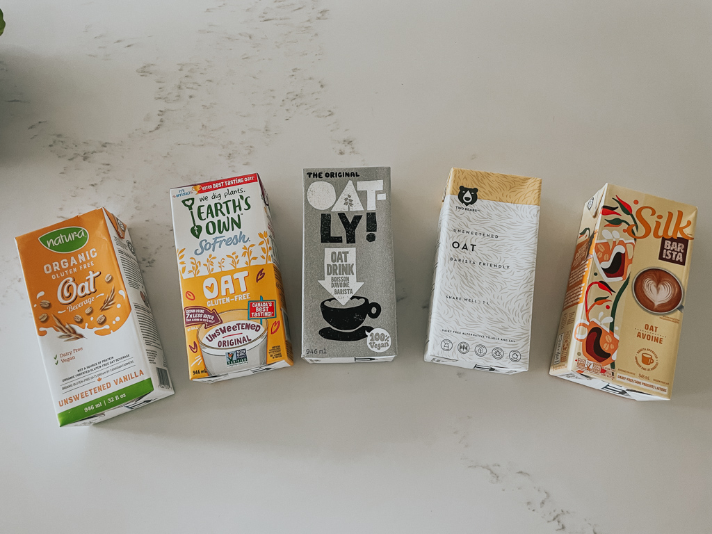 different oat milk brands laying flat