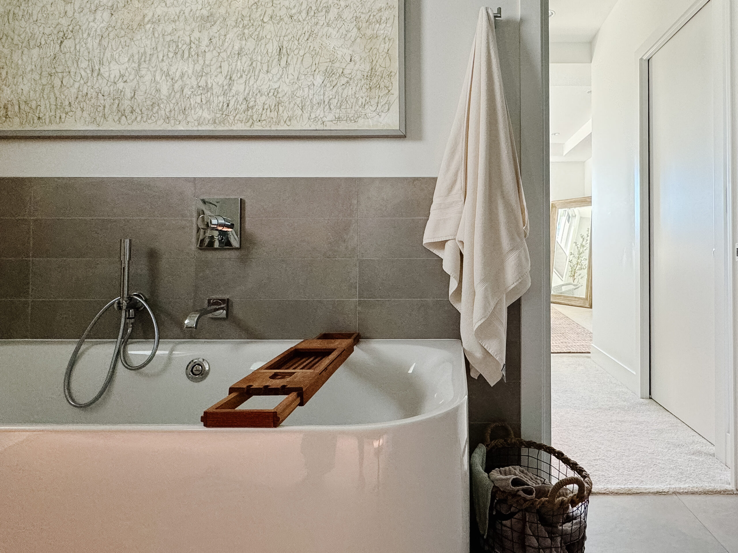 Luxury bathroom ideas. Super fluffy towel hanging by a tub